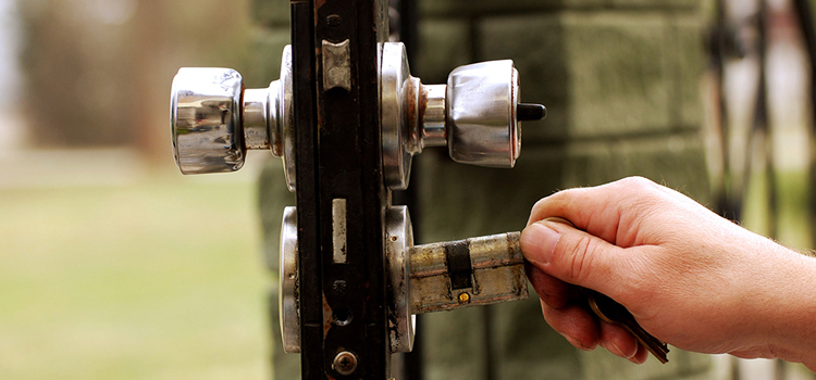 front door latch repair Magalia